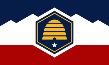Container Shipping to Maui 2 A hexagonal emblem with a beehive and star on a red, white, and blue background.