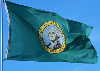 Washington state flag waving in the wind.